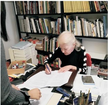 Kevin signs a contract